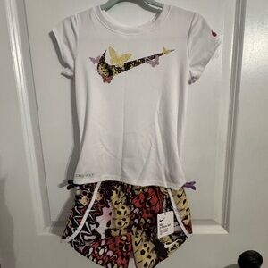 Nike White Tee with Butterfly and Patterned Shorts